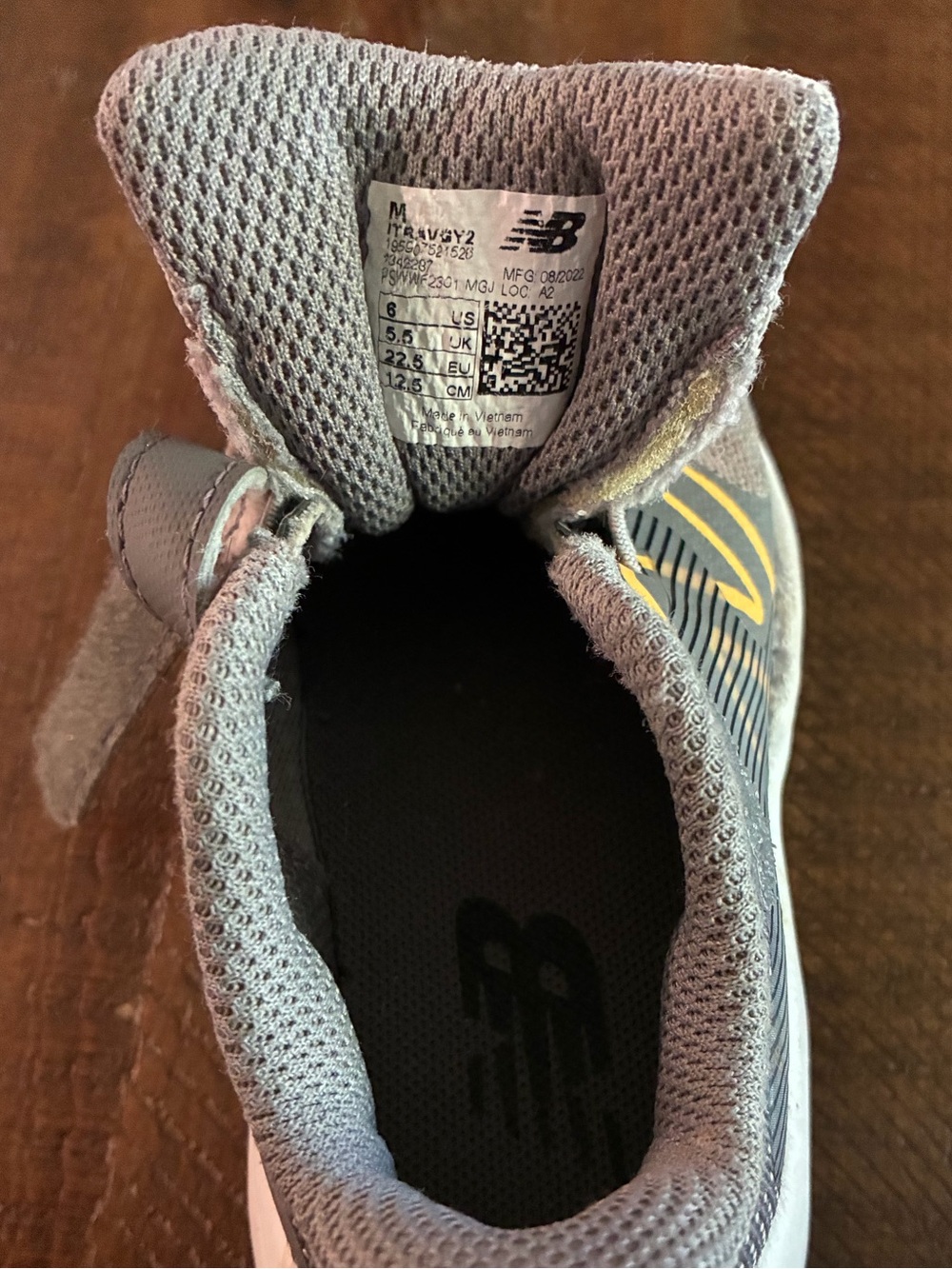 New Balance Grey and Yellow Kids' Sneakers with Blue Accent - Picture 2 of 3